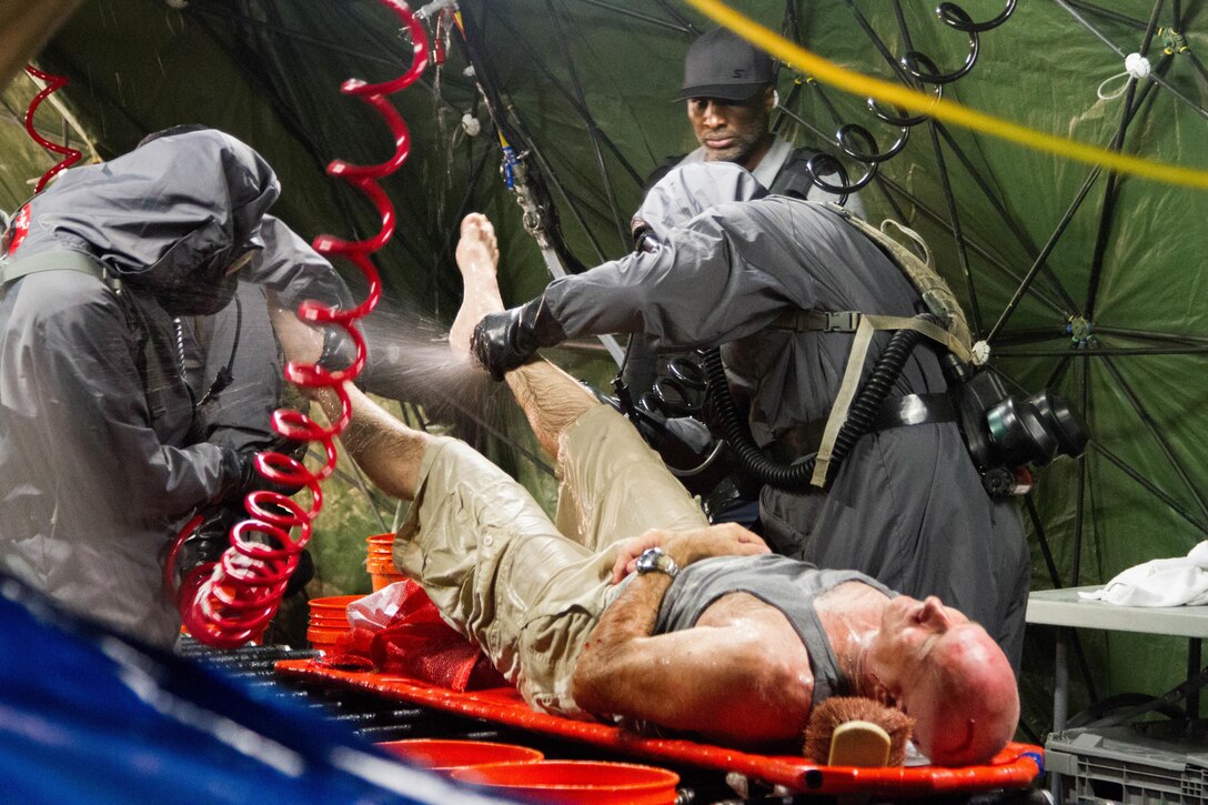 Soldiers with the 172nd Hazard Response Company from Fort Riley, Kansas, run a decontamination site Aug. 25, 2016 at Fort Hood, Texas during Exercise Sudden Response 16. The weeklong exercise was a key training event for the 172nd HR Co. and various other units within Joint Task Force Civil Support, a rapidly deployable force of more than 5,000 service members from across the country who are specially trained and equipped to provide life-saving assistance in the event of chemical, biological, radiological or nuclear disasters in the U.S. (U.S. Army photo by Sgt. Marcus Floyd, 13th Public Affairs Detachment)