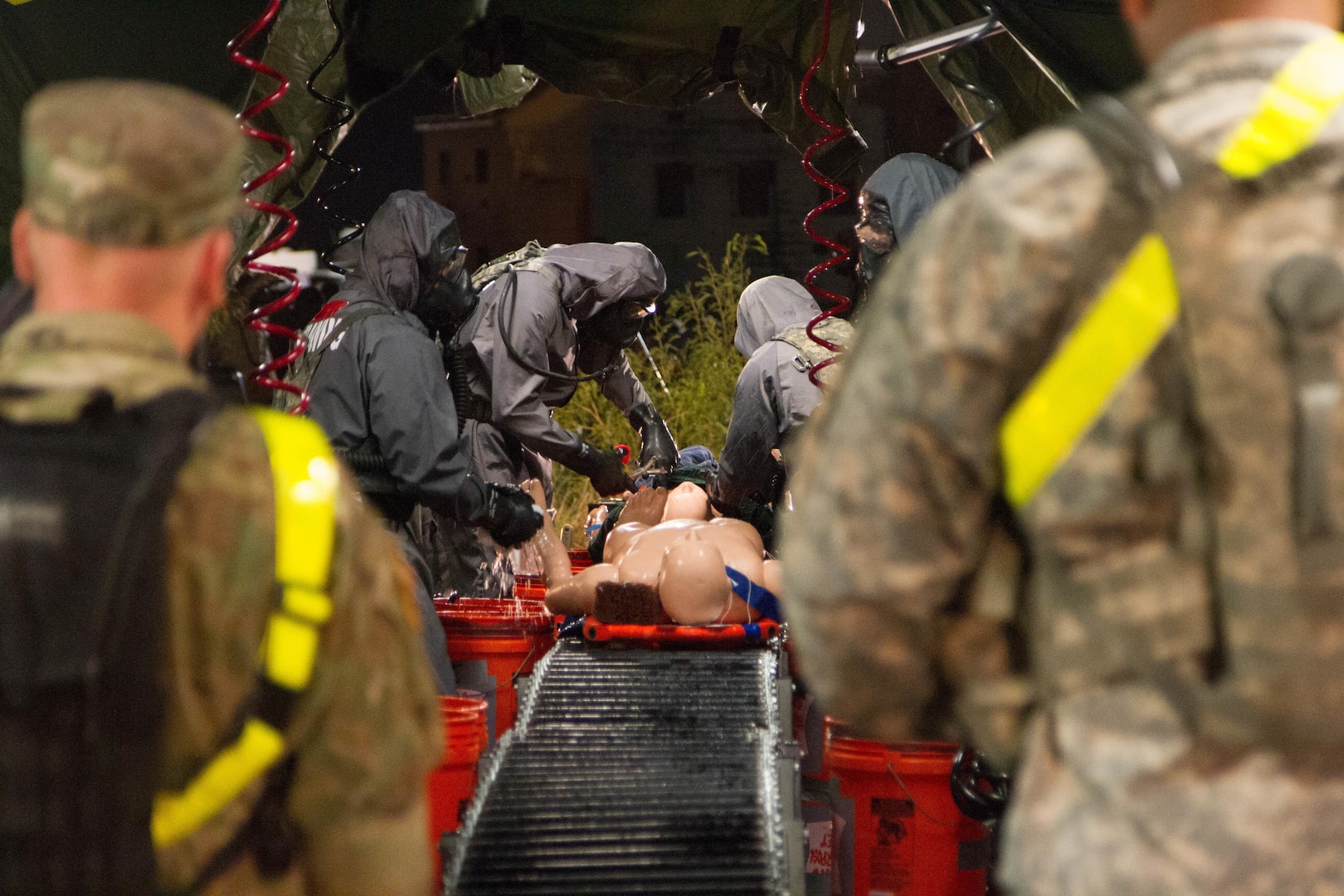 Soldiers with the 172nd Hazard Response Company from Fort Riley, Kansas, run a decontamination site Aug. 25, 2016 at Fort Hood, Texas during Exercise Sudden Response 16. The weeklong exercise was a key training event for the 172nd HR Co. and various other units within Joint Task Force Civil Support, a rapidly deployable force of more than 5,000 service members from across the country who are specially trained and equipped to provide life-saving assistance in the event of chemical, biological, radiological or nuclear disasters in the U.S. (U.S. Army photo by Sgt. Marcus Floyd, 13th Public Affairs Detachment)