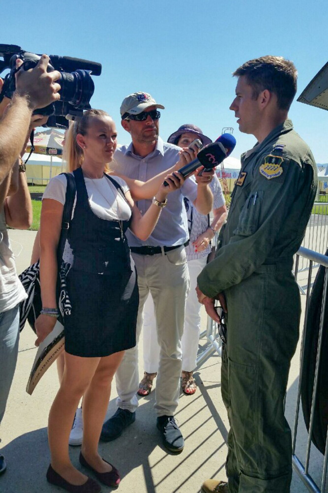 A U.S. Air Force Capt. Mark Budgeon, aircrew member from the 11th Bomb Squadron, interviews with local media during a special tour of a B-52H Stratofortress on Aug. 26,2016, Sliac, Slovakia. The B-52 is assigned to the Reserve 307th Bomb Wing, Barksdale Air Force Base, La., and arrived in Sliač to support the Slovak International Air Fest. (U.S. Air Force photo by Master Sgt. Andrew Branning/Released)