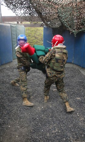 Recruits from Charlie Company, 1st Recruit Training Battalion, battle each other during Pugil Sticks III at Marine Corps Recruit Depot San Diego, Aug. 23. The match was won when one recruit delivered a strike to the head or multiple body strikes. Annually, more than 17,000 males recruited from the Western Recruiting Region are trained at MCRD San Diego. Charlie Company is scheduled to graduate Sept. 16.