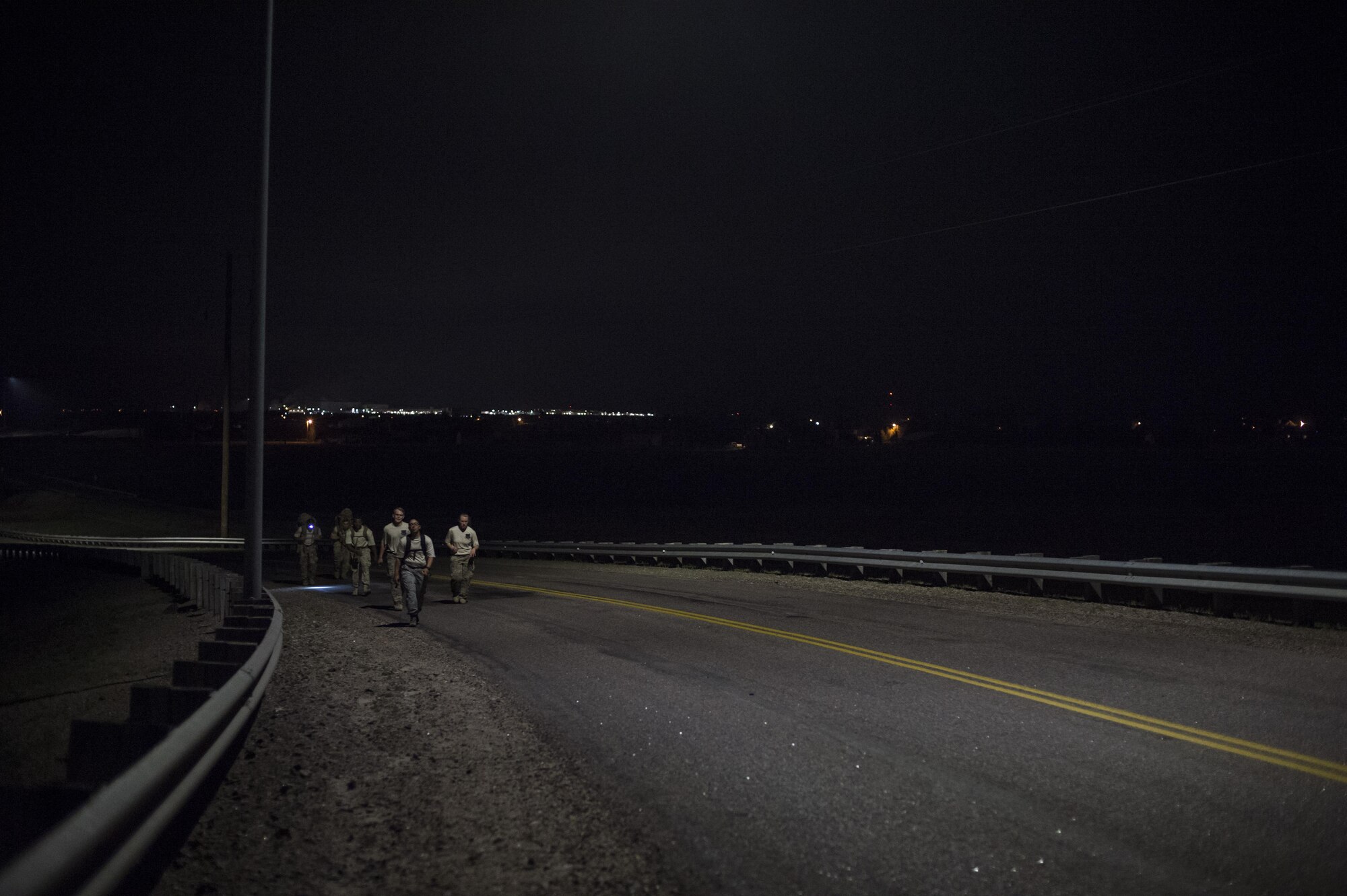 Crow Creek Challenge Airmen run to a checkpoint at F.E. Warren Air Force Base, Wyo., Aug. 26, 2016. In addition to the individual events, security forces members carried a 35-pound ruck sack on the six-mile challenge course. The 22nd CCC tested defenders’ mission capabilities as a team in a physically and mentally stressful environment. (U.S. Air Force photo by Staff Sgt. Christopher Ruano)