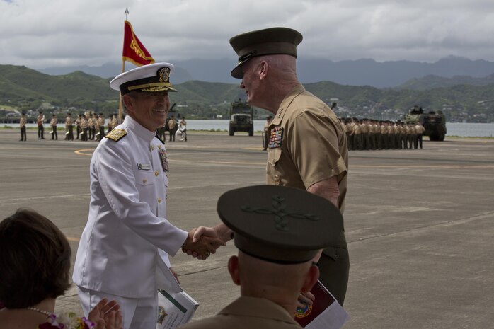 Adm. Harry B. Harris, commander, U.S. Pacific Command, left, shakes hands with Lt. Gen. John A. Toolan, outgoing commander, U.S. Marine Corps Forces, Pacific, during a change of command ceremony at Marine Corps Base Hawaii, Aug. 26, 2016. During the ceremony, Toolan relinquished command to Lt. Gen. David H. Berger. (U.S. Marine Corps photo by Lance Cpl. Matthew Casbarro/Released)