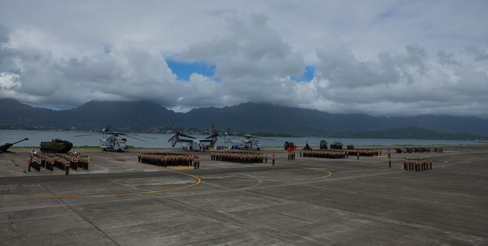 U.S. Marines with Headquarters, U.S. Marine Corps Forces, Pacific; MARFORPAC Band; I Marine Expeditionary Force; III Marine Expeditionary Force; U.S. Marine Corps Forces, Korea; and 1st Battalion, 12th Marine Regiment stand at attention during the MARFORPAC change of command ceremony at Marine Corps Base Hawaii, Aug. 26 2016.  The change of command ceremony represents the transfer of responsibility and authority from Lt. Gen. John A. Toolan to Lt. Gen. David H. Berger. (U.S. Marine Corps photo by Lance Cpl. Miguel A. Rosales/ Released)