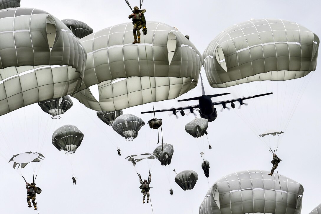 Soldiers conduct an airborne operation at Joint Base Elmendorf-Richardson, Alaska, Aug. 23, 2016, during Exercise Spartan Agoge. The soldiers are paratroopers assigned to the 25th Infantry Division’s 4th Brigade Combat Team (Airborne). Air Force photo by Justin Connaher