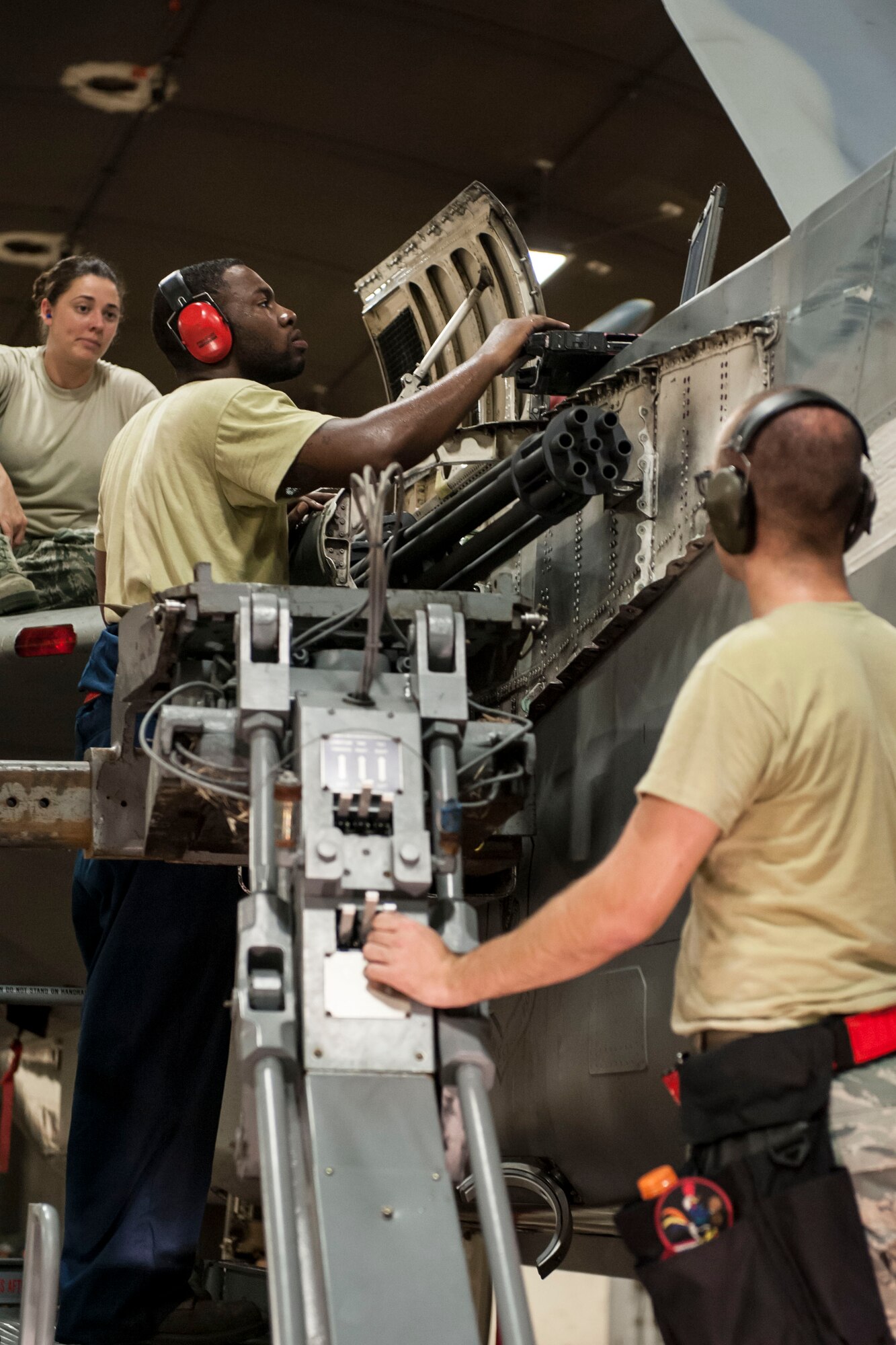 Staff Sgt. James Smith, 67th Aircraft Maintenance Unit weapons load crew chief, checks computer data on an F-15 Eagle Aug. 24, 2016, at Kadena Air Base, Japan. Smith led his load crew in an M-61A1 cannon swap project for the aircraft. (U.S. Air Force photo by Senior Airman Peter Reft)