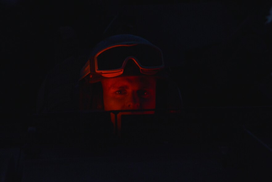 A Marine sits in a light-armored vehicle during a training scenario in a field near Camp Fuji, Japan, Aug. 24, 2016. Marines stationed at Camp Fuji conduct regular training exercises to ensure their mobility and mission readiness through various rough terrain. They worked with the Yokota Arts and Crafts to allow photo enthusiasts to practice their photography skills simultaneously. (U.S. Air Force photo by Senior Airman David Owsianka/Released)