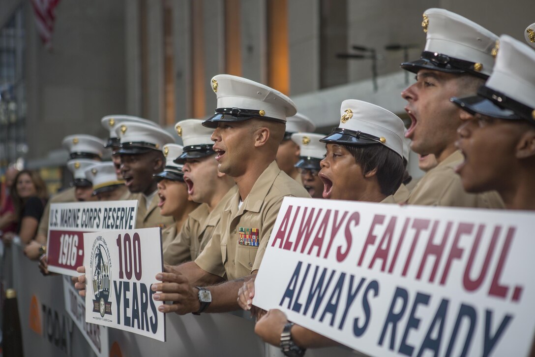 Reserve Marines cheer outside of the Today Show at Rockefeller Center, during the celebration of the U.S. Marine Corps Reserve Centennial, Aug. 29, 2016. The Marines are commemorating 100 years of rich history, heritage, esprit de corps, and a bond with not only New York City but with all communities across the U.S. The celebration brings awareness to the Reserve’s essential role as a crisis response force and expeditionary force in readiness that is always prepared to augment the active component. (U.S. Marine Corps photo by Sgt. Sara Graham)
