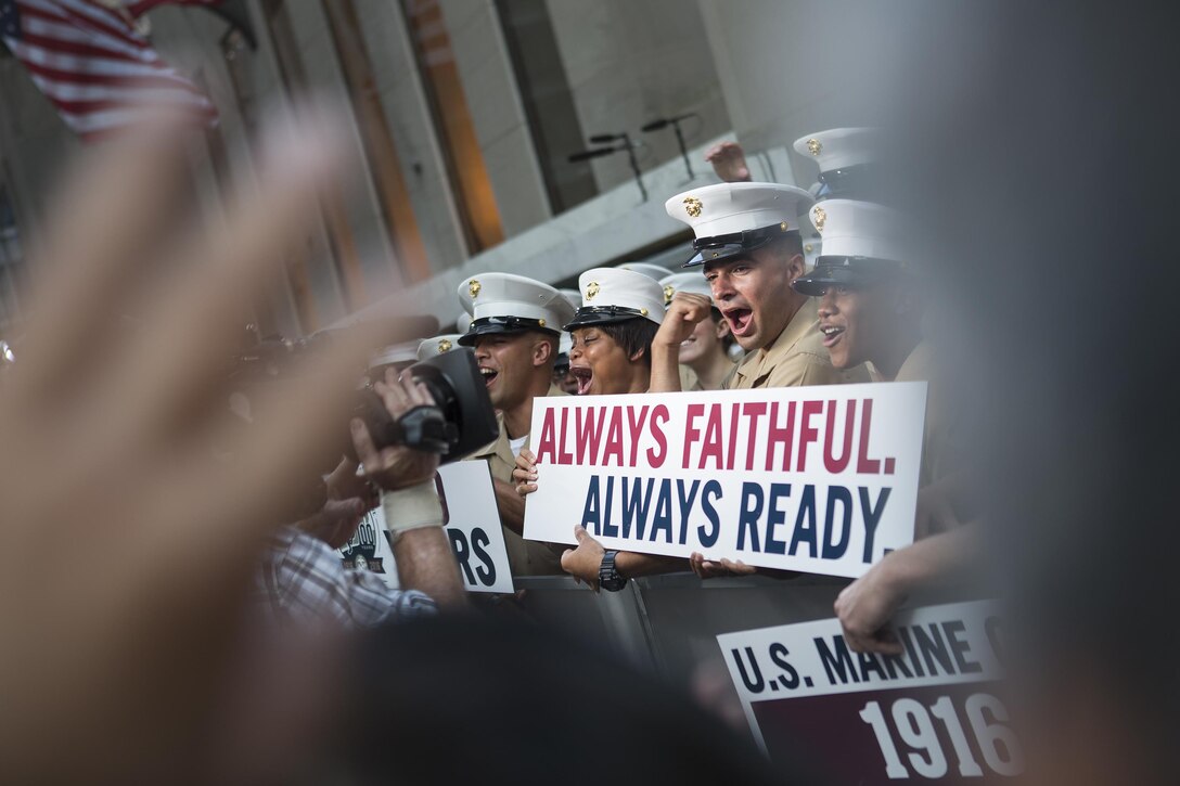 Reserve Marines cheer outside of the Today Show at Rockefeller Center, during the celebration of the U.S. Marine Corps Reserve Centennial, Aug. 29, 2016. The Marines are commemorating 100 years of rich history, heritage, esprit de corps, and a bond with not only New York City but with all communities across the U.S. The celebration brings awareness to the Reserve’s essential role as a crisis response force and expeditionary force in readiness that is always prepared to augment the active component. (U.S. Marine Corps photo by Sgt. Sara Graham)