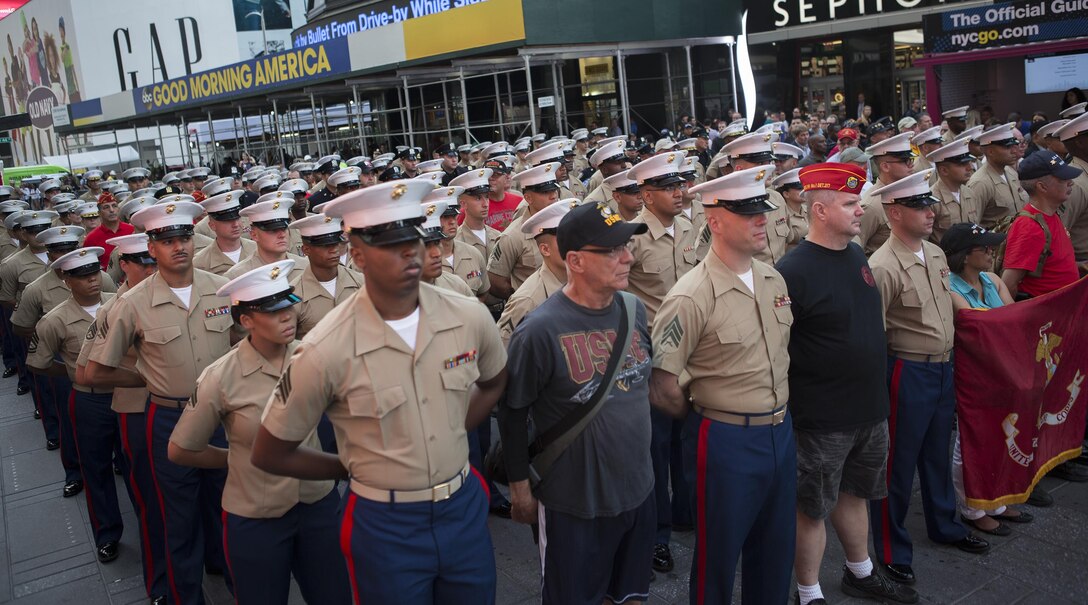 Roughly 500 current and past Marines stand in formation at Times Square for the U.S. Marine Corps Reserve Centennial celebration, Aug. 29, 2016. For 100 years the Marine Corps Reserve has answered the call, serving as our nation’s crisis response force and expeditionary force in readiness. The centennial celebration is a way to honor years of selfless service and celebrate the Marine Corps’ rich history, heritage and esprit de corps. The celebration brings awareness to the Reserve’s essential role as a crisis response force and expeditionary force in readiness that is always prepared to augment the active component. (U.S. Marine Corps photo by Sgt. Sara Graham)
