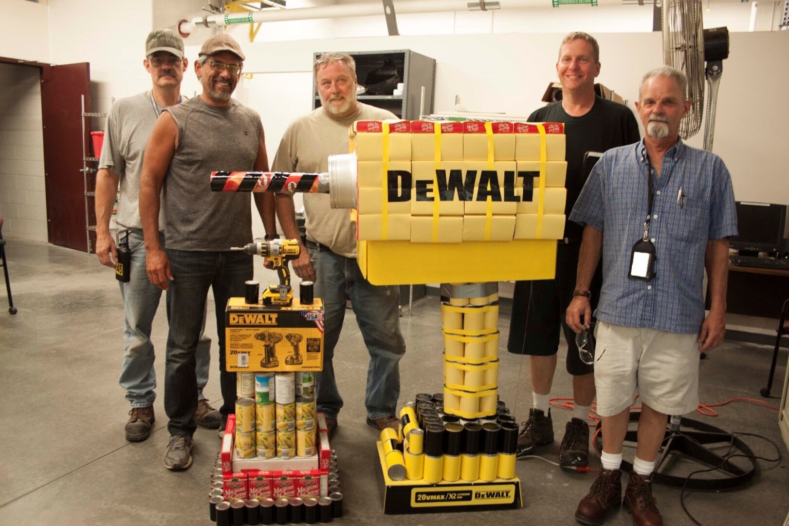 Members of the Maintenance Shop team pose with their working DeWalt drill.  The drill won first place in DLA Installation Support at Susquehanna’s “CANstruction” challenge, benefitting the Central Pennsylvania Food Bank through the 2016 Feds Feed Families Food campaign.  