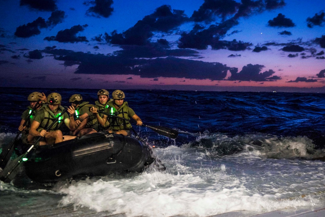 Marines depart the well deck of the amphibious transport dock ship USS Green Bay in a combat rubber raiding craft in the Pacific Ocean, Aug. 29, 2016. The Green Bay iis operating in the U.S. 7th Fleet area of operations to support security and stability in the Indo-Asia-Pacific region. The Marines are assigned to the 31st Marine Expeditionary Unit. Navy photo by Petty Officer 3rd Class Patrick Dionne