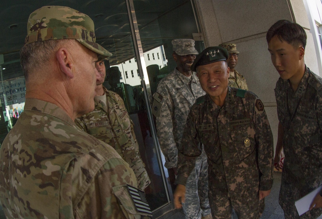 South Korean Army General Ki-Hak Eom, commander of the Third Republic of Korea Army, greets U.S. Army Lt. Gen. Stephen R. Lanza (far left), I Corps commanding general, at TROKA headquarters in Yongin, South Korea, Aug. 26, 2016. (U.S. Army photo by Staff Sgt. Ken Scar)