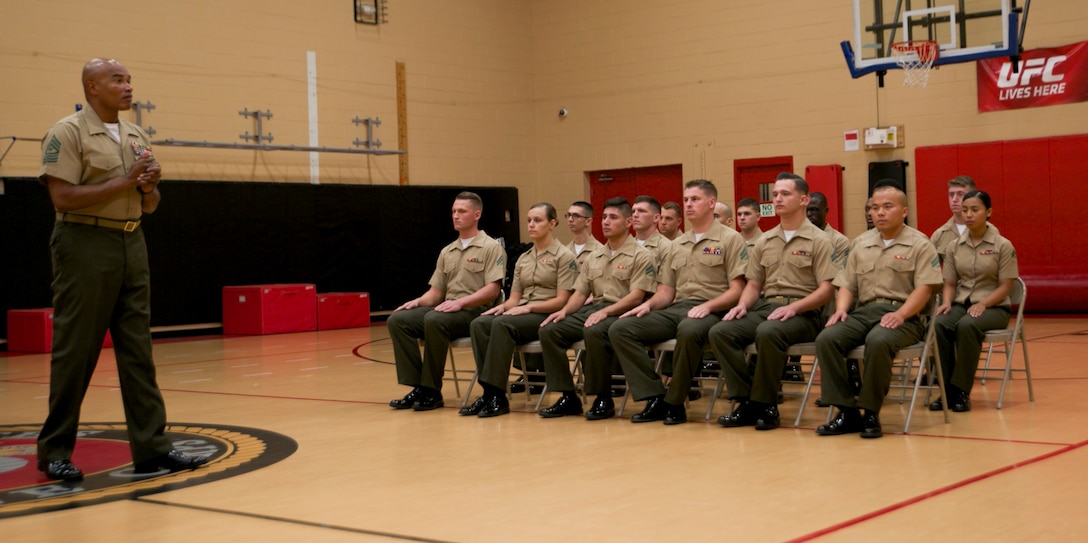 Sgt. Maj. Adam J. Moore, Headquarters and Service Battalion sergeant major, speaks to Corporal’s Course 3-16 during their graduation ceremony at Hopkins Hall Gym aboard Camp Allen, Va., Aug. 26. Over the course of three weeks the Marines learned what it takes to become successful small-unit leaders and were mentally and physically challenged during the course.  (Official U.S. Marine Corps photo by Sgt. Calvin Shamoon/ Released) 