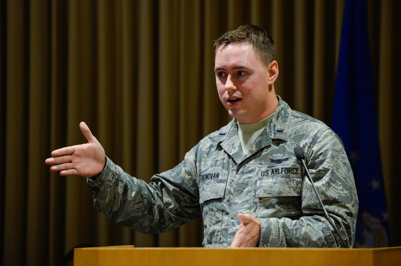 Second Lt. Sean Donovan, 4th Space Operations Squadron, explains why the new blended retirement system is a better option for Airmen during the first Schriever Debate at Schriever Air Force Base, Colorado, Thursday, Aug. 25, 2016. The Schriever Top III sponsored the event, in part, to give Team Schriever members an opportunity to discuss and learn about topics affecting both their professional and personal development. (U.S. Air Force photo/Christopher DeWitt)