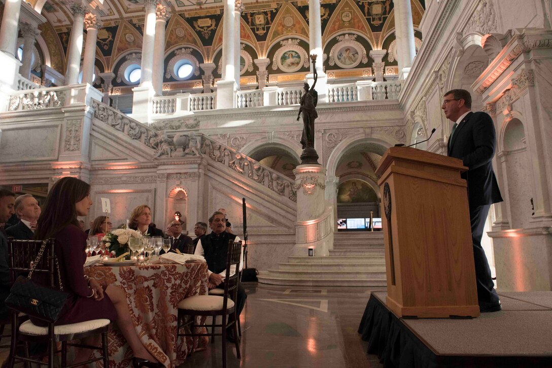 Defense Secretary Ash Carter speaks at a dinner he hosted for  Indian Defense Minister Manohar Parrikar, center, at the Library of Congress in Washington, D.C., Aug. 29, 2016. Carter and his Indian counterpart met earlier in the day and held a joint news conference at the Pentagon. DoD photo by Navy Petty Officer 1st Class Tim D. Godbee