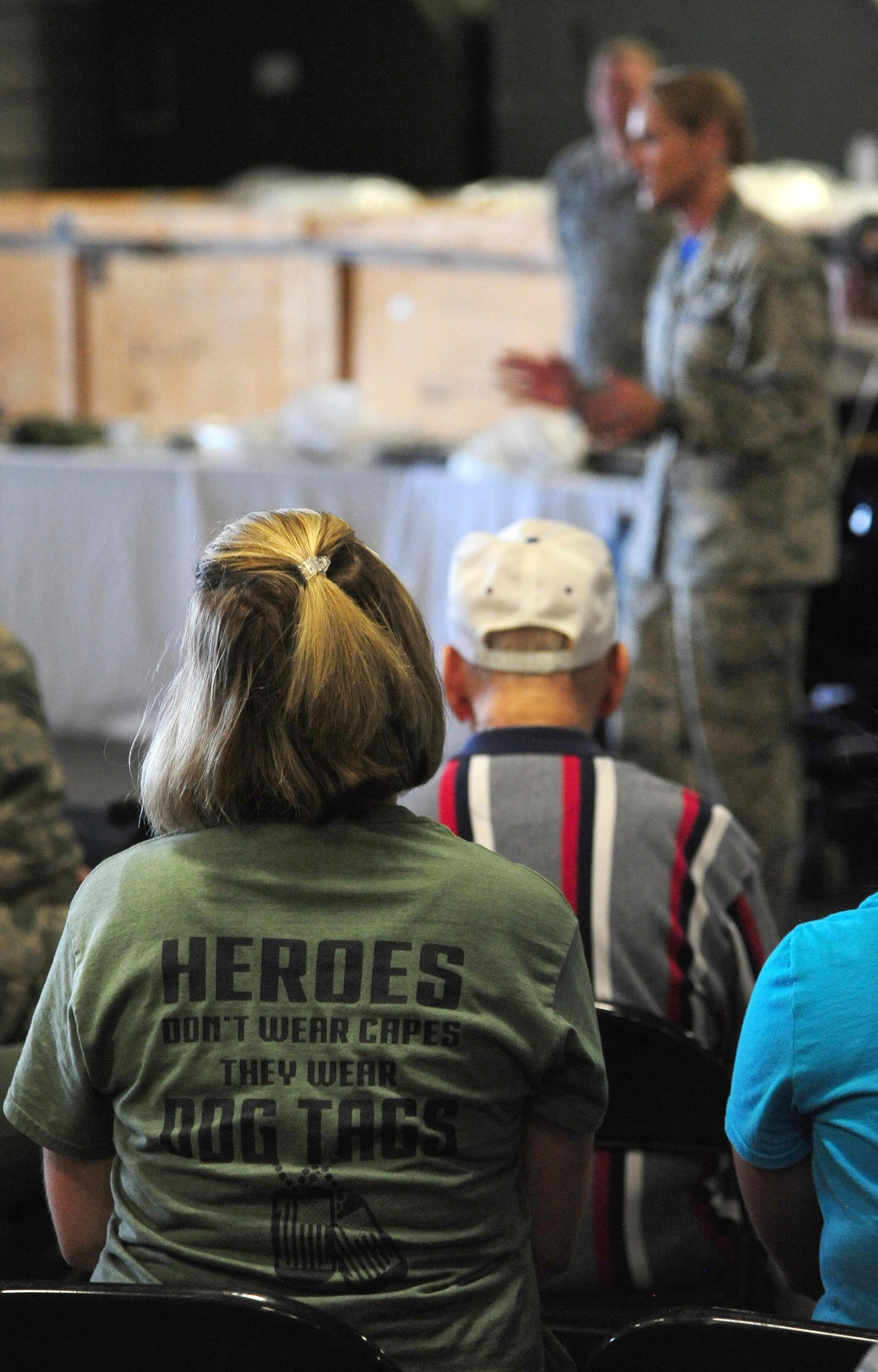 A staff member from the Missouri Veterans’ Home receives a briefing from U.S. Air Force Maj. Kellie Courtland, the 509th Logistics Readiness Squadron commander, during a visit to Whiteman Air Force Base, Mo., Aug. 26, 2016. After learning more about the Whiteman mission, the veterans also toured the B-2 Spirit. (U.S. Air Force photo by Senior Airman Joel Pfiester)