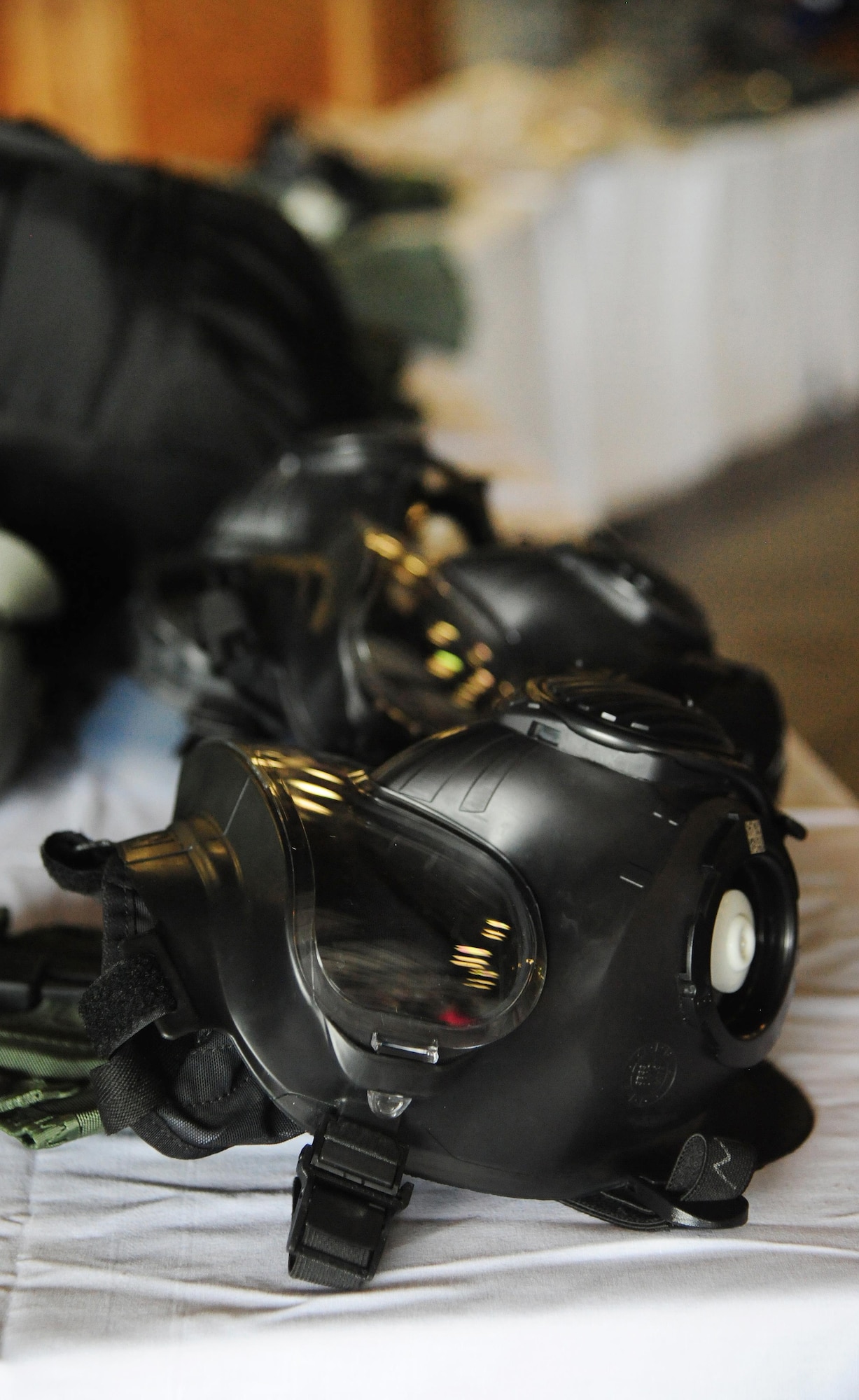 An M50 gas mask is displayed on a table during a visit from the Missouri Veterans’ Home at Whiteman Air Force Base, Mo., Aug. 26, 2016. Several squadrons gave the veterans demonstrations and briefings on different gear they use during daily operations. (U.S. Air Force photo by Senior Airman Joel Pfiester)