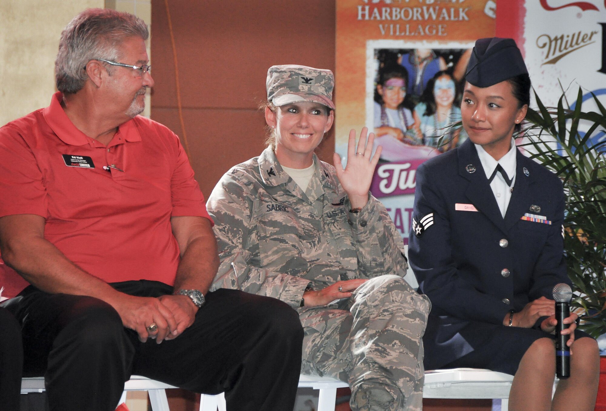 Col. Regina Sabric, the 919th Special Operations Group commander, was honored at the Harborwalk Village’s Red, White and Blue Hero celebration Aug. 25 in Destin, Fla.  She was one of a few honorees highlighted during the weekly summer event.  (U.S. Air Force photo/Lt. Col. James Wilson)  