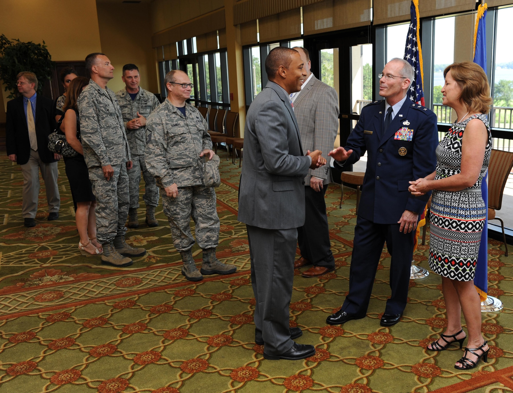 Maj. Gen. Bob LaBrutta, incoming 2nd Air Force commander, and his wife, Leslie, are welcomed by Keesler personnel during the 2nd AF change of command reception  at the Bay Breeze Event Center Aug. 26, 2016, on Keesler Air Force Base, Miss. LaBrutta was previously the 502nd Air Base Wing and Joint Base San Antonio, Texas, commander, and assumed command from Maj. Gen. Mark Brown, who is heading to Joint Base San Antonio-Randolph, Texas, where he will become the Air Education and Training Command vice commander. (U.S. Air Force photo by Kemberly Groue/Released)