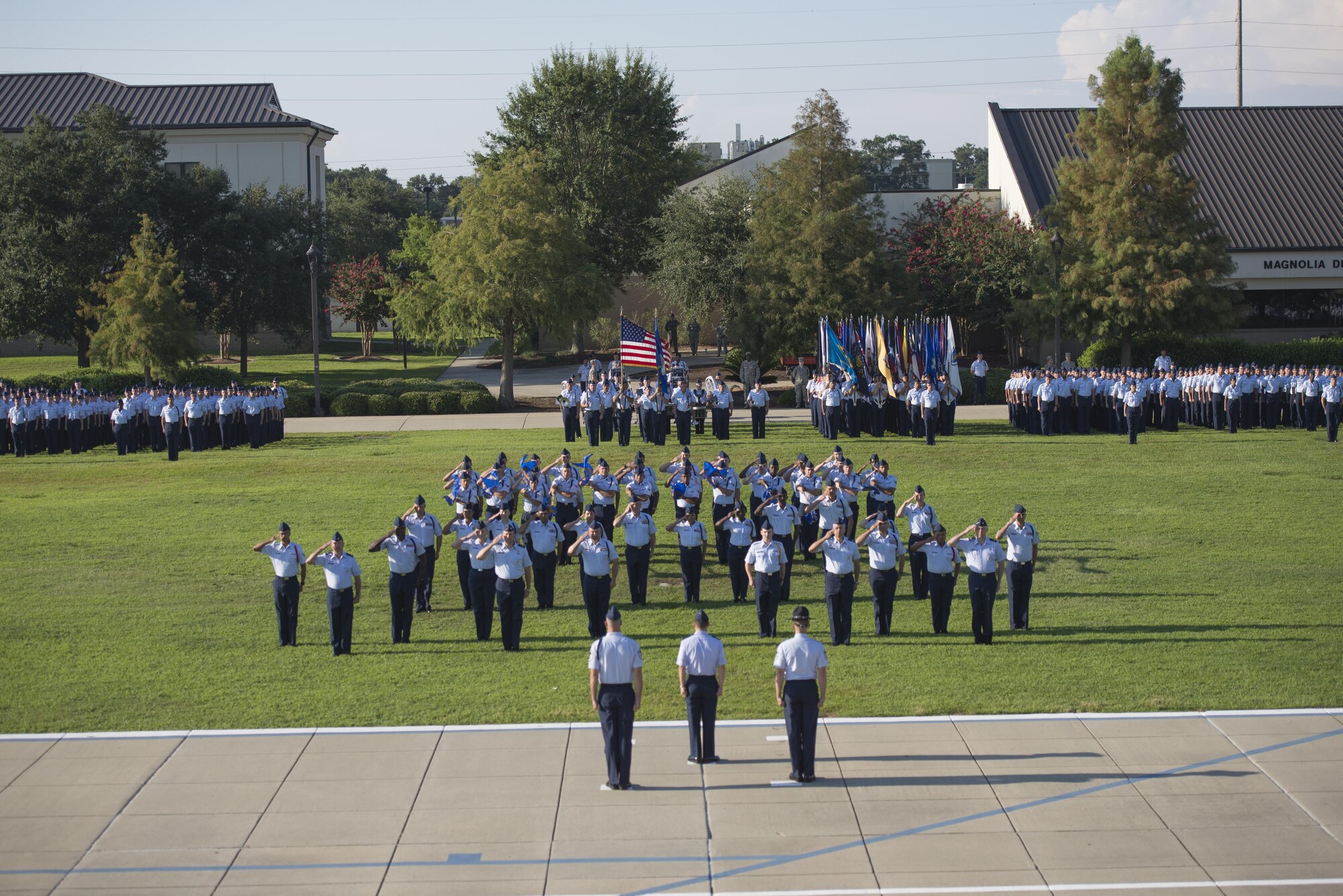 Parade group officers salute the commander of troops during the 2nd Air Force change of command ceremony at the Levitow Training Support Facility Aug. 26, 2016, on Keesler Air Force Base, Miss. Maj. Gen. Bob LaBrutta assumed command at the ceremony from Maj. Gen. Mark Brown who is heading to Joint Base San Antonio- Randolph, Texas, where he will become the Air Education and Training command vice commander. LaBrutta was previously the 502nd Air Base Wing and Joint Base San Antonio, Texas, commander.  (U.S. Air Force photo by Andre Askew/Released)