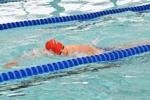 Wyatt Owen swims a lap in the Tierra Vista Community Center pool at Schriever Air Force Base, Colorado, during the 12th annual Schriever Air Force Base Triathlon Friday, Aug. 26, 2016. Owen was one of the 25 total participants who swam 400 meters, biked 12 miles and ran 3.1 miles during the event. (U.S. Air Force photo/Brian Hagberg)