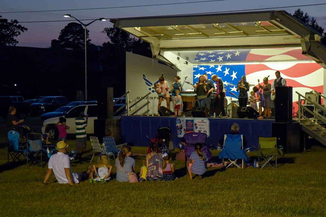 The “Don Thompson” band plays music for the crowd during the postponed Independence Day celebration, Aug. 26, 2016, at Seymour Johnson Air Force Base, North Carolina. The event featured multiple food vendors and activities and ended with a fireworks show. (U.S. Air Force photo by Airman Shawna L. Keyes)