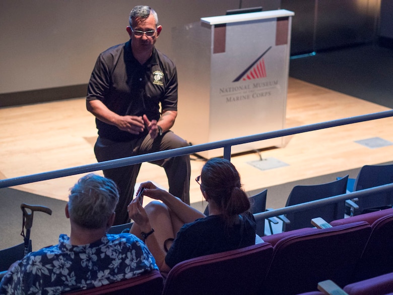 MCICOM Emergency Manager Section Head presents general pet preparedness information during the Dog Days of Summer event at the National Museum of the Marine Corps on Saturday, Aug. 27, 2016. 