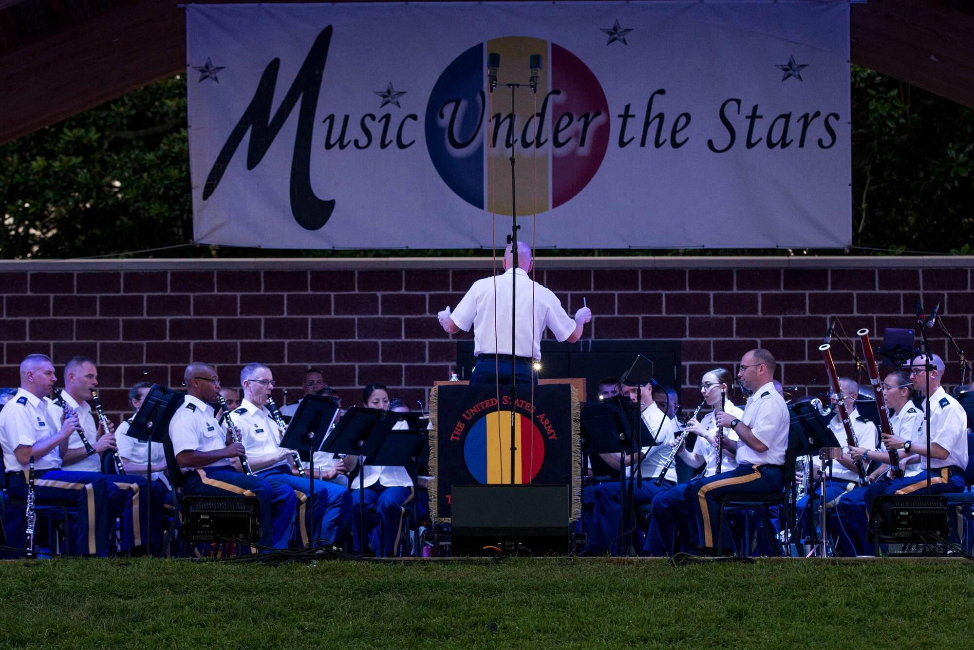 U.S. Army Training and Doctrine Command (TRADOC) Band perform during the final “Music Under the Stars” concert at Fort Eustis, Va., Aug. 25, 2016. The TRADOC band performs several concerts in support of local, regional and national events including festivals, parades and city and state commemorations. (U.S. Air Force photo by Airman 1st Class Derek Seifert)