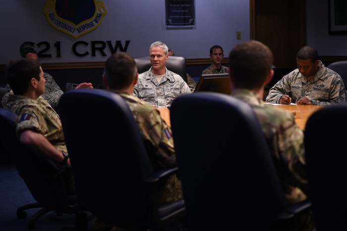 U.S. Air Force Col. Charles Henderson, 621st Contingency Response Wing commander, speaks to members of the United Kingdom Royal Air Force Expeditionary Air Wing at Joint Base McGuire-Dix-Lakehurst, New Jersey August 22, 2016. The CRW is trained to deploy at a moment’s notice anywhere around the world to open bare base airfields in austere environments. (U.S. Air Force photo by Tech. Sgt. Gustavo Gonzalez)