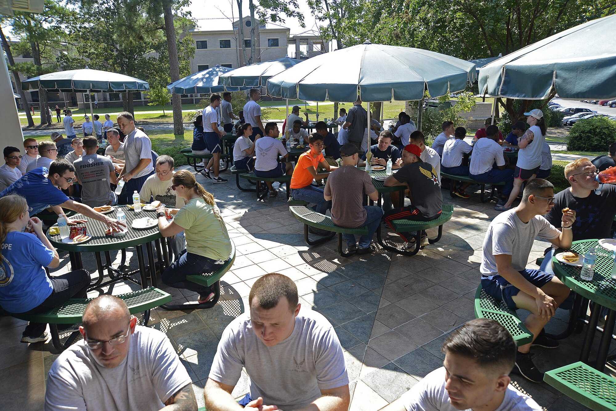 Members of Team Shaw gather together for an endoftheday
BBQ to celebrate after cleaning the dorms at Shaw Air Force Base, S.C., Aug. 27, 2016. The dorm cleanup gives supervisors and their Airmen an opportunity to relate to each other in a more casual environment. (U.S. Air Force photo by Airman BrieAnna Stillman)