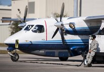 Senior Airman Alyson Hill, 919th Special Operations Maintenance Group, waits to begin her preflight duties before a C-145A Skytruck mission at Duke Field, Fla.   The Skytrucks are primarily used for new aircrew qualifications and flight proficiency missions.  (U.S. Air Force photo/Tech. Sgt. Sam King)