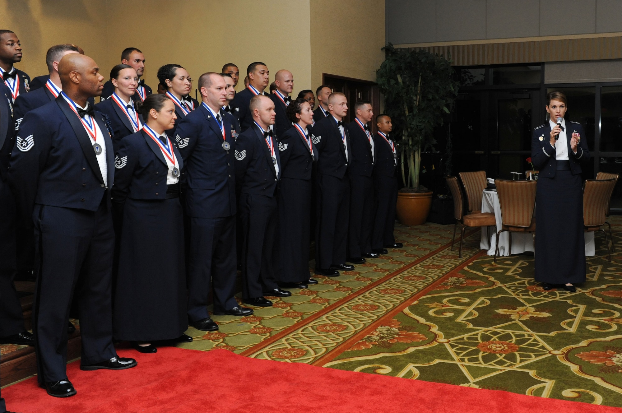 Col. Michele Edmondson, 81st Training Wing commander, delivers remarks during the Senior Noncommissioned Officer Induction Ceremony at the Bay Breeze Event Center Aug. 18, 2016, on Keesler Air Force Base, Miss. Thirty-seven enlisted members were recognized and received a commemorative medallion at the event. (U.S. Air Force photo by Kemberly Groue/Released)