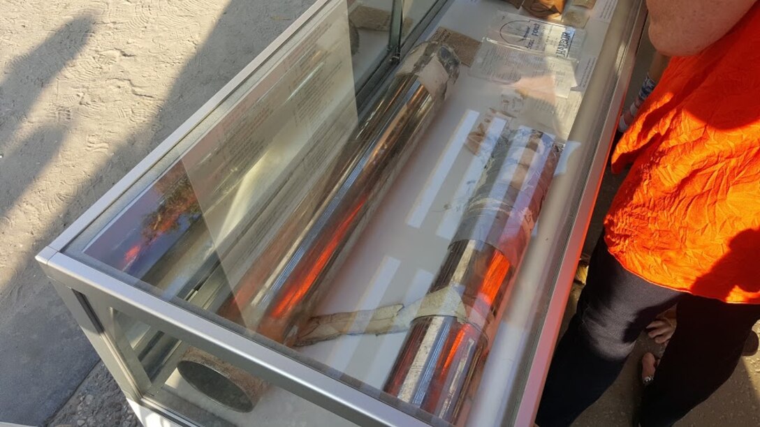 The 50-year old time capsule removed from the original Dana Point Harbor rock placement sits in a display case following an anniversary celebration held at the harbor. The time capsule included newspaper articles, original plans for the harbor and questions asked to be answered 50 years in the future.
