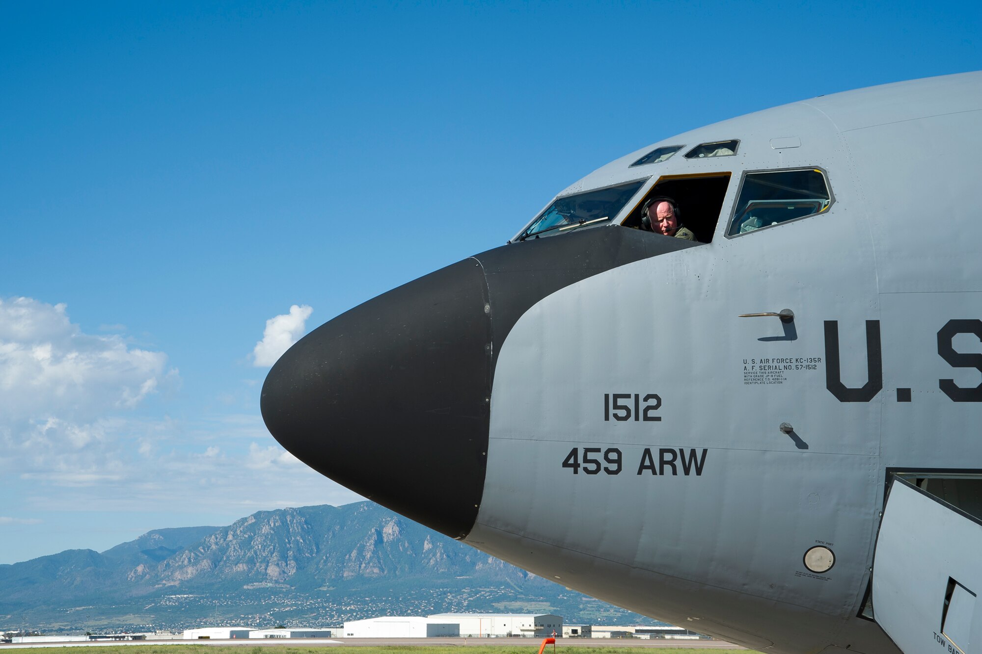 Colonel Thomas Pemberton, 459th Operations Group commander and pilot, looks out the window of a KC-135R Stratotanker during pre-flight checks on the Peterson Air Force Base, Colorado, flight line, Sunday, Aug. 28, 2016. More than a dozen 459th Aeromedical Evacuation Squadron flight nurses, technicians and administrators flew to Peterson to conduct joint unit training with other AE squadrons on board the KC-135, C-17 Globemaster III and C-130H3 Hercules. (U.S. Air Force photo/Staff Sgt. Kat Justen)