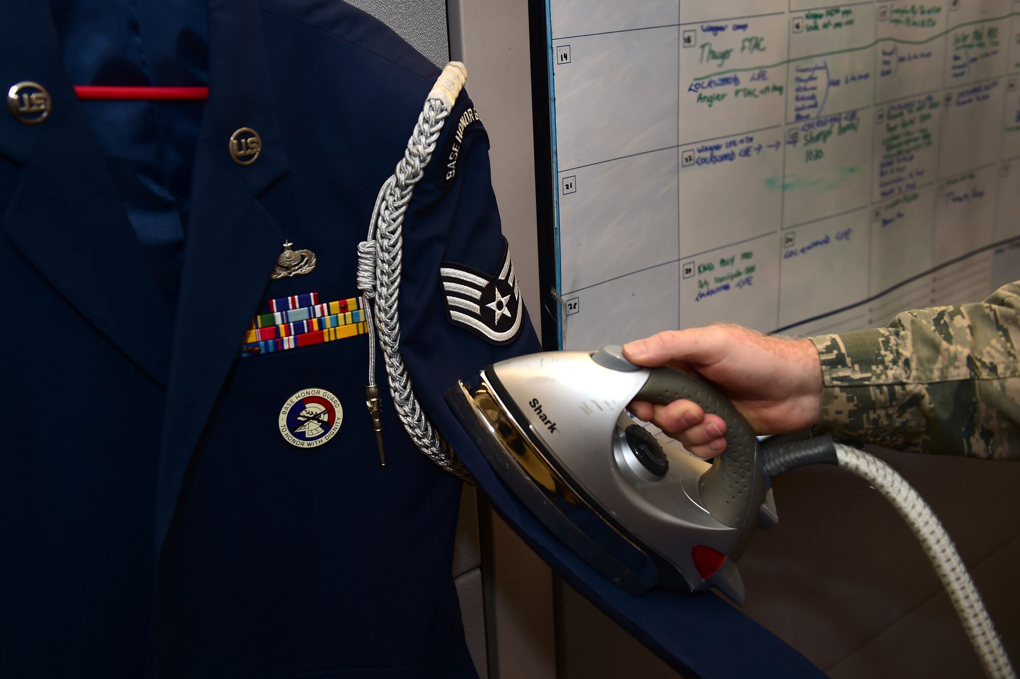 A U.S. Air Force Mile High Honor Guard member steams an honor guard uniform to prepare for a funeral August 30, 2016, on Buckley Air Force Base, Colo. The primary mission of the Honor Guard on Buckley AFB is to provide well-trained, highly professional members to render honors at various military ceremonies. (U.S. Air Force photo by Airman 1st Class Gabrielle Spradling/Released)