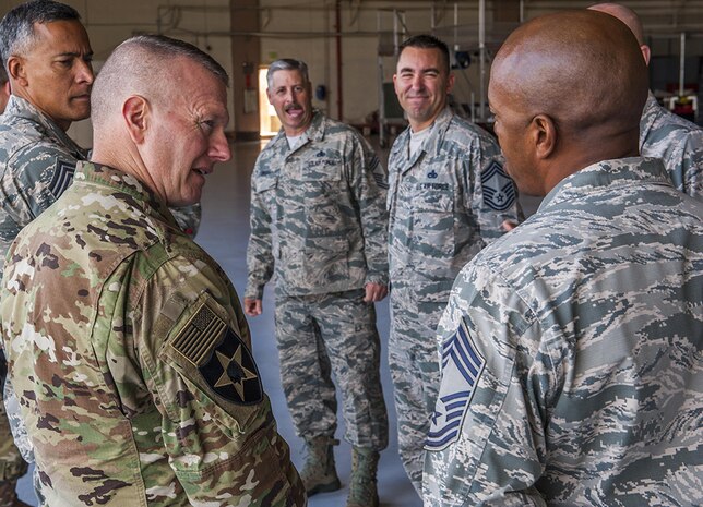 Command Sgt. Maj. John W. Troxell, senior enlisted advisor to the chairman of the Joint Chiefs of Staff, speaks with members of the 67th Fighter Squadron, Aug. 29, 2016, at Kadena Air Base, Japan. Troxell visited the 33rd Rescue Squadron and the 67th FS as part of his visit to Kadena, learning about Airmen and their leadership.