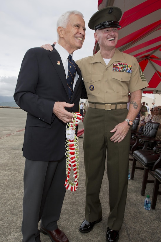 Lt. Gen. Hank C. Stackpole, retired, and former U.S. Marine Corps Forces, Pacific commander, speaks with Sgt. Maj. Paul G. McKenna, MARFORPAC sergeant major during the change of command ceremony at Marine Corps Base, Hawaii, Aug. 26, 2016. The change of command ceremony represents the transfer of responsibility and authority over MARFORPAC from outgoing to incoming commanders. 