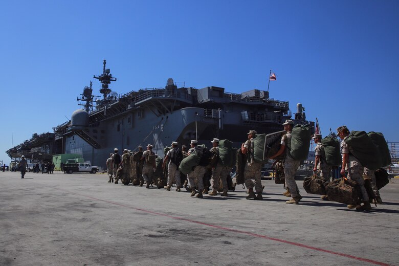 Marines with Task Force Los Angeles prepare to board the USS America (LHA 6) at Naval Base San Diego, Calif., Aug. 29, 2016. The ship will carry Marines, Sailors, and Coast Guardsmen to Los Angeles Fleet Week, Sept. 2 – Sept. 5. Fleet Weeks are annual patriotic events where active Navy and Coast Guard ships dock in major U.S. cities giving Marines, Sailors and Coast Guardsmen an opportunity to interact with locals. This is the first year L.A. has hosted an official Fleet Week event. (U.S. Marine Corps photo by Lance Cpl. Caitlin Bevel)