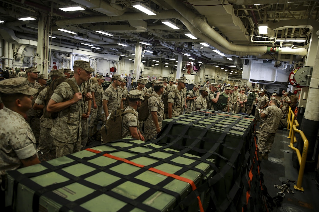 Marines with Task Force Los Angeles assemble aboard the USS America (LHA 6) at Naval Base San Diego, Calif., Aug. 29, 2016. The ship will carry Marines, Sailors, and Coast Guardsmen to Los Angeles Fleet Week, Sept. 2 – Sept. 5. Fleet Weeks are annual patriotic events where active Navy and Coast Guard ships dock in major U.S. cities giving Marines, Sailors and Coast Guardsmen an opportunity to interact with locals. This is the first year L.A. has hosted an official Fleet Week event. (U.S. Marine Corps photo by Lance Cpl. Caitlin Bevel)