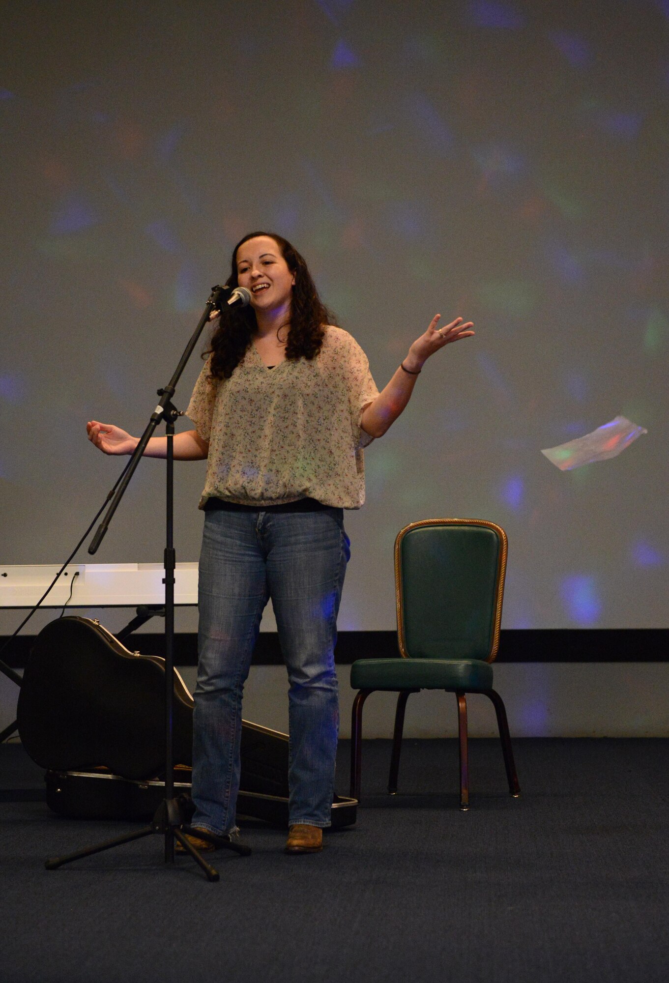 Robin Ellis, 36th Civil Engineer Squadron environmental specialist, performs a musical number at the Women’s Equality Day event Aug. 26, 2016, at Andersen Air Force Base, Guam. The event marked the observance’s 96th anniversary and served as a tribute to women’s right to vote. (U.S. Air Force photo by Airman 1st Class Arielle Vasquez/Released)