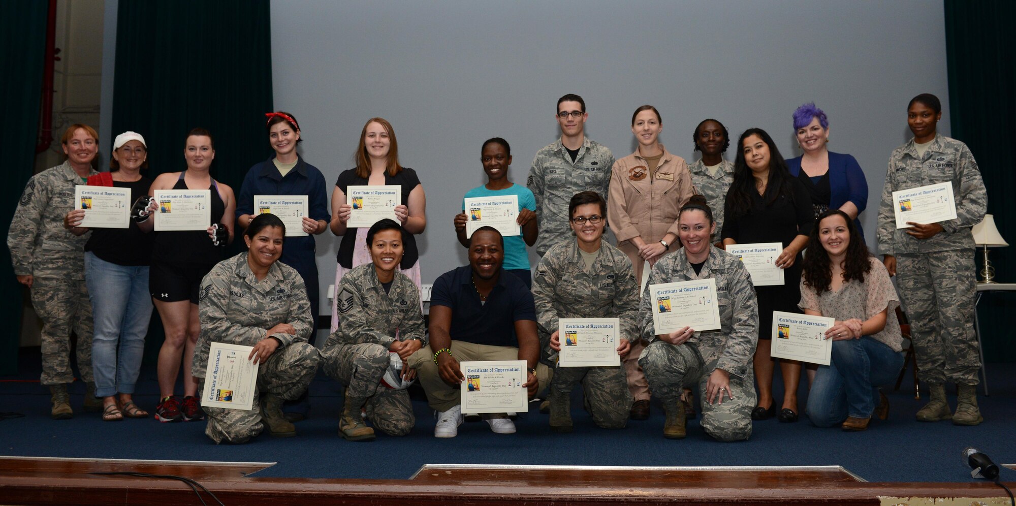 Participants for the Women’s Equality Day event stand for a group photo Aug. 26, 2016, at Andersen Air Force Base, Guam. This marked the 3rd annual event held at Andersen to celebrate women’s right to vote.  (U.S. Air Force photo by Airman 1st Class Arielle Vasquez/Released)