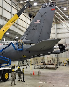 Airmen with the 191st Maintenance Group work to repair the vertical stabilizer of a KC-135 Stratotanker at Selfridge Air National Guard Base, Mich. The aircraft had been struck by lightning shortly before landing at the base in late 2015. The aircraft landed without incident, but required extensive repairs. It has since been returned to service. (U.S. Air National Guard photo by Terry Atwell)