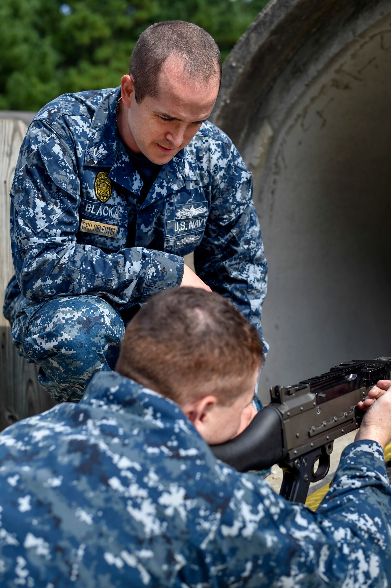 Chief Petty Officer Selectee Joseph Blacka, a 628th Security Forces Harbor Security Department Master-at-Arms leading petty officer, teaches sailors about weapons at Joint Base Charleston, South Carolina, Aug. 23, 2016. (U.S. Air Force Photo/Airman Megan Munoz)