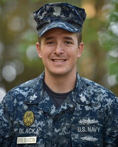 Chief Petty Officer Selectee Joseph Blacka, a 628th Security Forces Harbor Security Department Master-at-Arms leading petty officer, smiles at Joint Base Charleston, South Carolina, Aug. 23, 2016. (U.S. Air Force Photo/Airman Megan Munoz)