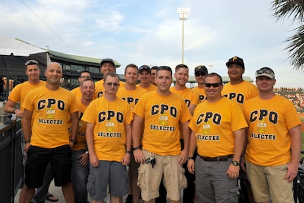 A group of Chief Petty Officer selects from Joint Base Charleston pose for a group photo during a Military Appreciation Night at a RiverDogs baseball game, August, 24, 2016. (U.S. Air Force photo/TSgt Renae Pittman)
