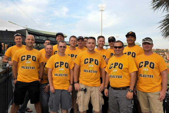 A group of Chief Petty Officer selects from Joint Base Charleston pose for a group photo during a Military Appreciation Night at a RiverDogs baseball game, August, 24, 2016. (U.S. Air Force photo/TSgt Renae Pittman)
