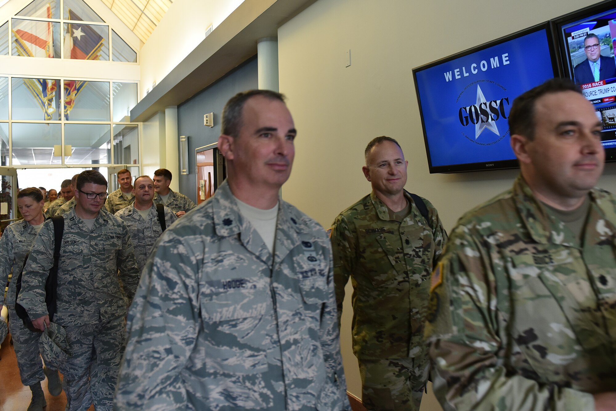 National Guard Soldiers, Airmen and civilians assigned to general officers in the states, territories and the District of Columbia head to networking breakout sessions Aug. 30, 2016, during the General Officer Support Staff Course at the I.G. Brown Training and Education Center on McGhee Tyson Air National Guard Base in Louisville, Tenn. (U.S. Air National Guard photo by Master Sgt. Mike R. Smith)