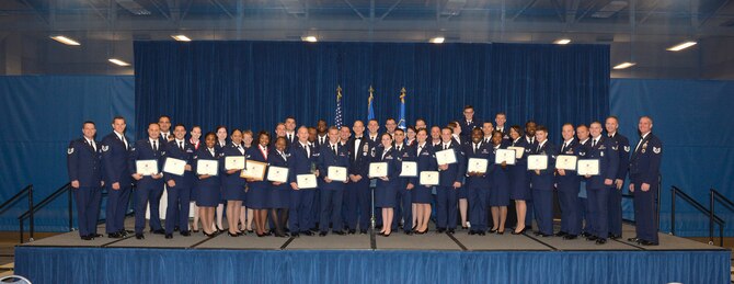 Student and staff from Airman leadership school class 16-8 gather on stage to celebrate the completion of the first blended learning course, here, Aug. 26, 2016, at the I.G. Brown Training and Education Center in Louisville, Tenn. Blended learning is a facilitated online version of ALS combining distance learning and the in-residence professional miltiary education to better serve the needs of reserve force Airman and the Air Force. (U.S. Air National Guard photo by Master Sgt. Jerry D. Harlan/Released)