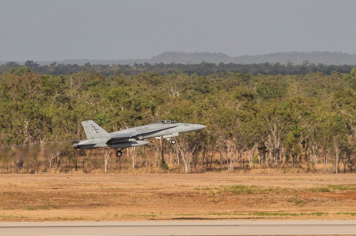An F/A-18C Hornet with Marine Fighter Attack Squadron (VMFA) 122 takes off during Southern Frontier at Royal Australian Air Force Base Tindal, Australia, Aug. 31, 2016. VMFA-122 executed low-altitude tactics training, flying below 500 feet to evade simulated enemy radar detection or to escape enemy aircraft vectored toward friendly aircraft. By integrating low-altitude tactics into the three week unit level training, pilots gained their final qualifications during Southern Frontier, strengthening the squadrons overall combat readiness. (U.S. Marine Corps photo by Cpl. Nicole Zurbrugg)