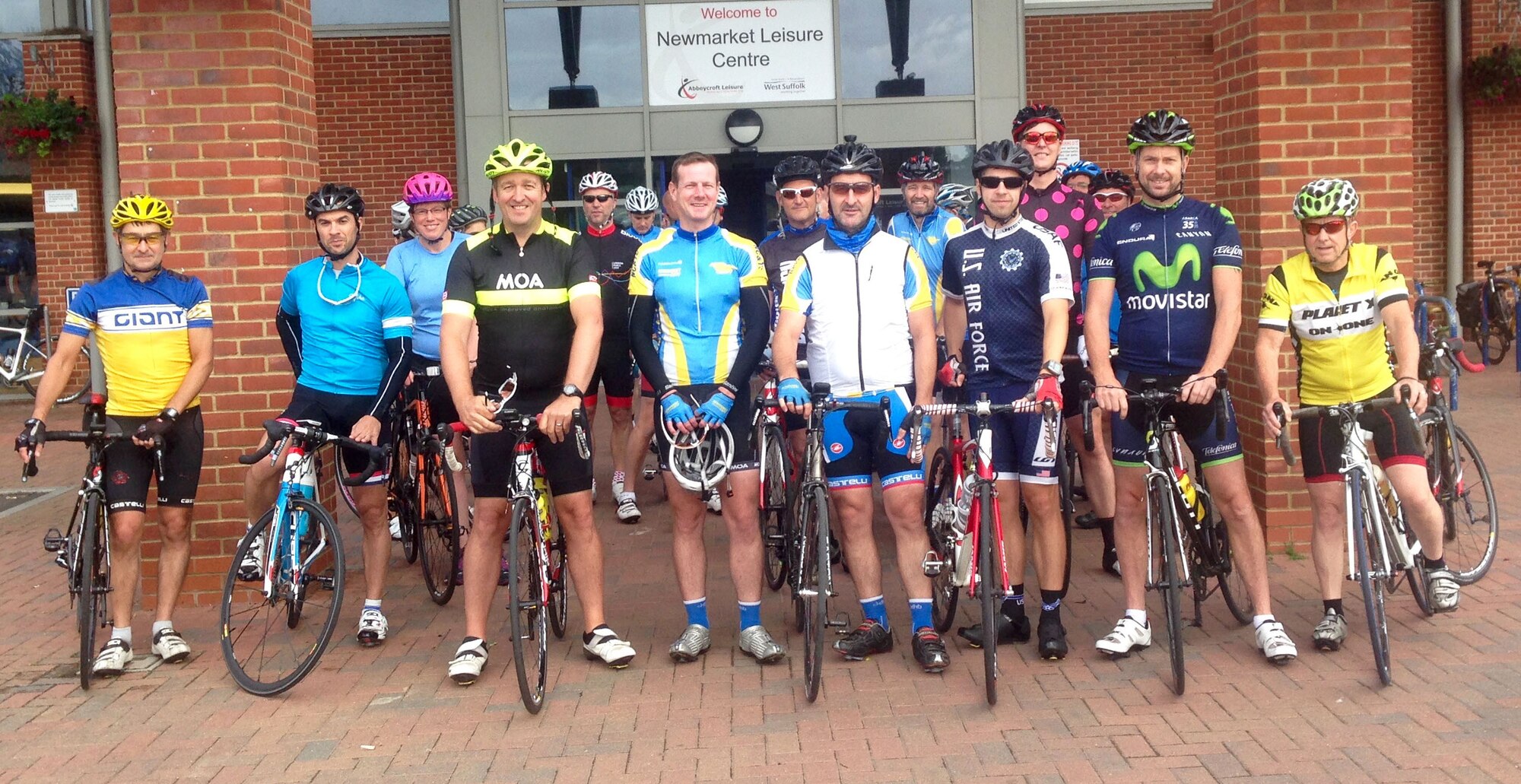 U.S. Air Force Tech. Sgt. Joshua Johnson, (front third from right), 100th Operations Support Squadron NCO in charge of Airfield Management training, poses for a photograph with the Newmarket Cycling and Triathlon Club following training Aug. 20, 2016, in Newmarket, Suffolk. Johnson enjoys many sports including running and cycling with both Airmen and the local community. (Courtesy photo)